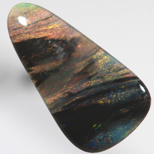 SOLID BLACK OPAL Banded pattern of red and green amongst black bands